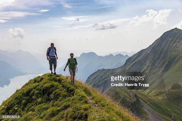 hiking in swiss alps - switzerland stock pictures, royalty-free photos & images