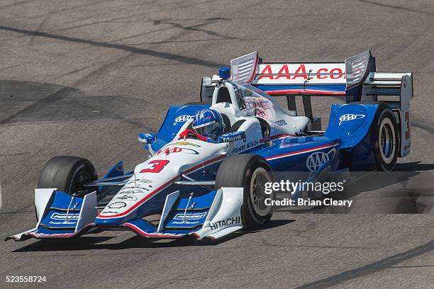 Helio Castroneves, of Brazil, drives the Chevrolet IndyCar on the track during practice for the Honda Indy Grand Prix of Alabama at Barber...