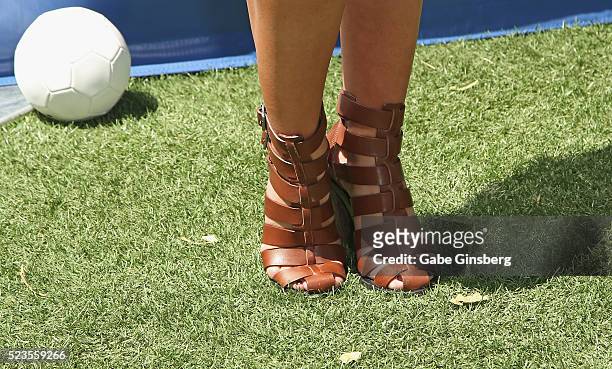 Octagon Girl Brittney Palmer, shoes detail, attends a fight weekend pool party at Sky Beach Club at the Tropicana Las Vegas on April 23, 2016 in Las...