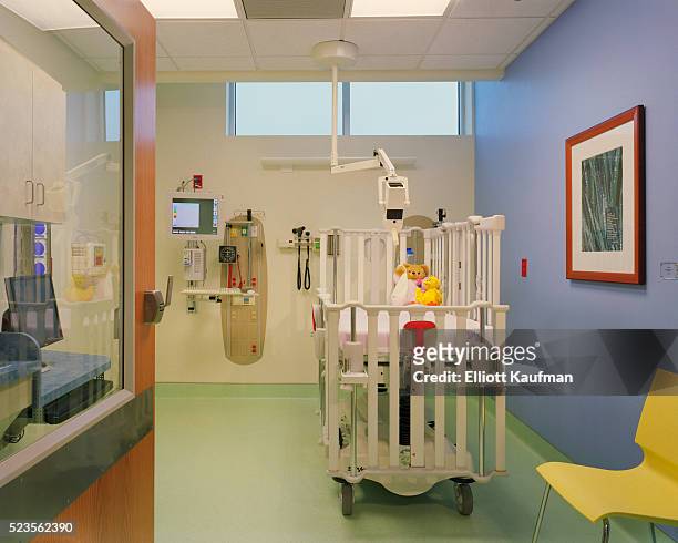 a hospital room for infant care in large regional hospital - hospital cot stock pictures, royalty-free photos & images
