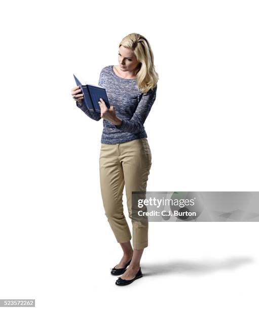 Standing Reading Woman Standing Book Photos and Premium High Res Pictures - Getty Images