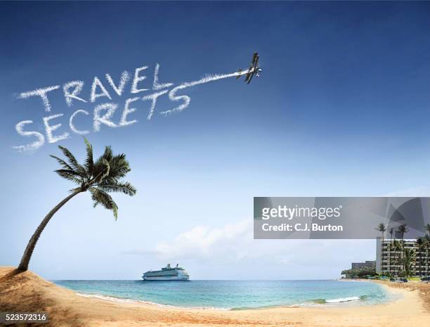 beach with palm trees and hotels - luchtschrift stockfoto's en -beelden