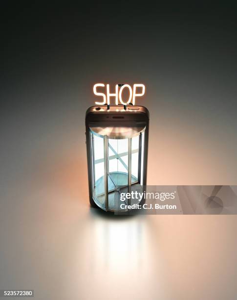 shop for smart phone - revolving door stock pictures, royalty-free photos & images