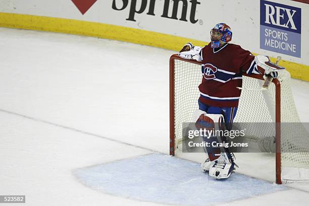 Goaltender Jose Theodore of the Montreal Canadiens takes a break against the Carolina Hurricanes during game two of the second round of the Stanley...