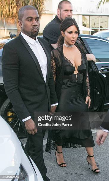 Kanye West and Kim Kardashian attend David Grutman's and model Isabela Rangel wedding in Wynwood Wall on April 23, 2016 in Miami, Florida.