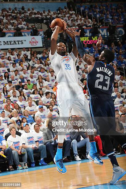 Kevin Durant of the Oklahoma City Thunder shoots the ball during the game against the Dallas Mavericks in Game One of the Western Conference...