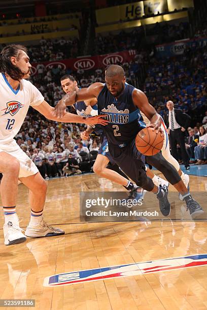 Raymond Felton of the Dallas Mavericks drives to the basket during the game against Steven Adams of the Oklahoma City Thunder in Game One of the...