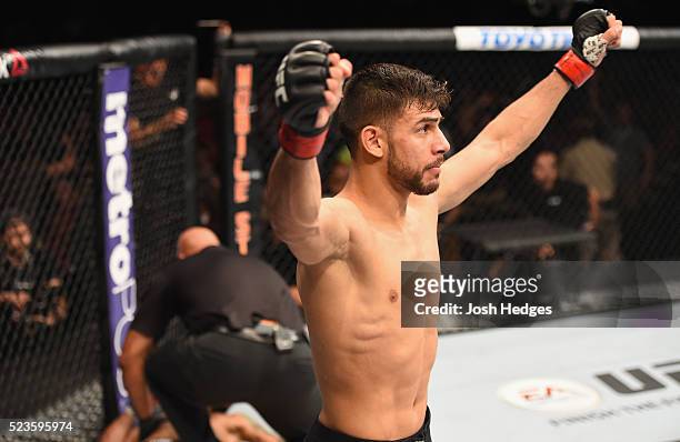 Yair Rodriguez of Mexico celebrates his knockout victory over Andre Fili in their featherweight bout during the UFC 197 event inside MGM Grand Garden...