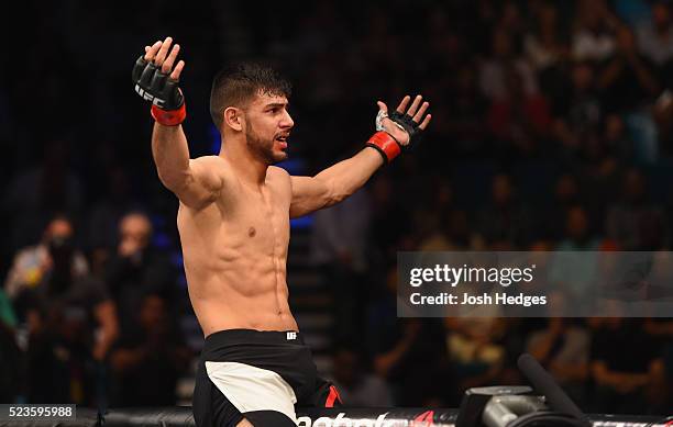 Yair Rodriguez of Mexico celebrates his knockout victory over Andre Fili in their featherweight bout during the UFC 197 event inside MGM Grand Garden...