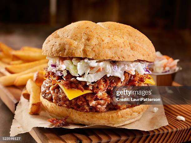 pulled pork hamburger - coleslaw stock pictures, royalty-free photos & images