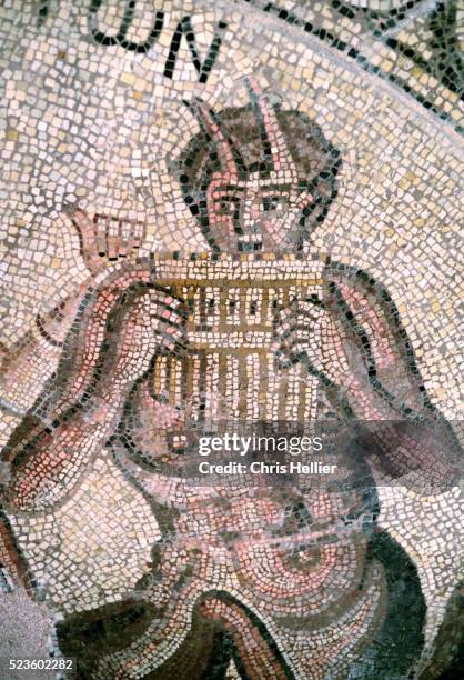 roman mosaic of triton playing pan pipes c4/5th - guaira fotografías e imágenes de stock