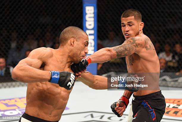 Anthony Pettis exchange punches with Edson Barboza in their lightweight bout during the UFC 197 event inside MGM Grand Garden Arena on April 23, 2016...