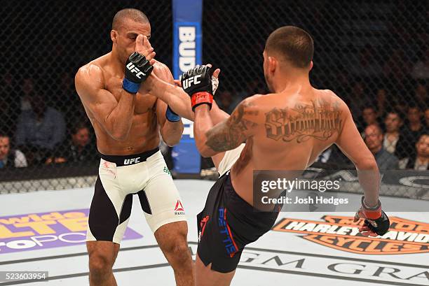 Anthony Pettis kicks Edson Barboza in their lightweight bout during the UFC 197 event inside MGM Grand Garden Arena on April 23, 2016 in Las Vegas,...