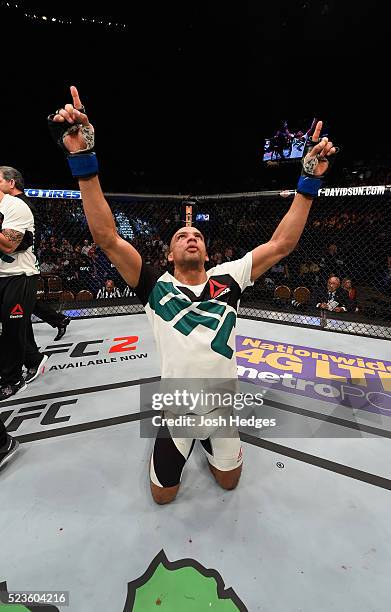 Edson Barboza celebrates his victory over Anthony Pettis in their lightweight bout during the UFC 197 event inside MGM Grand Garden Arena on April...