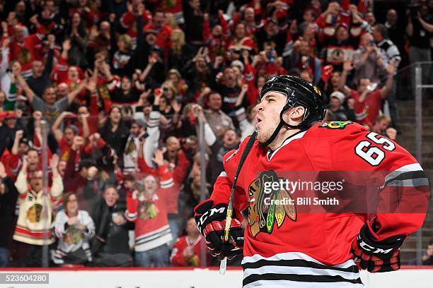 Andrew Shaw of the Chicago Blackhawks reacts after scoring against the St. Louis Blues in the third period of Game Six of the Western Conference...