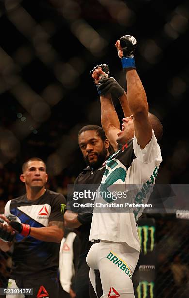 Edson Barboza celebrates his victory over Anthony Pettis in their lightweight bout during the UFC 197 event inside MGM Grand Garden Arena on April...