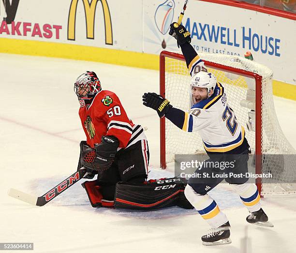 The St. Louis Blues' Alexander Steen, right, reacts after teammate Alex Pietrangelo, not pictured, scored past Chicago Blackhawks goaltender Corey...