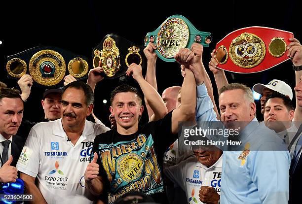 Gennady Golovkin of Kazakhstan poses with his belts after his second round TKO of Dominic Wade during a unified middleweight title fight at The Forum...