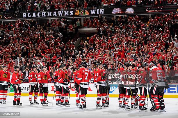 The Chicago Blackhawks celebrate after defeating the St. Louis Blues 6 to 3 during Game Six of the Western Conference First Round during the 2016 NHL...