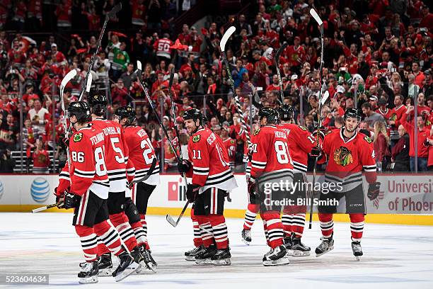 The Chicago Blackhawks celebrate after defeating the St. Louis Blues 6 to 3 during Game Six of the Western Conference First Round during the 2016 NHL...