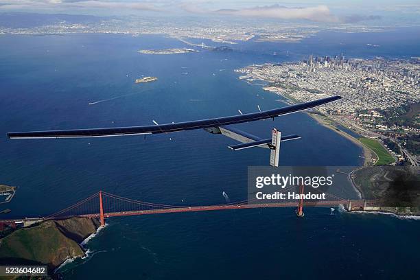 Solar Impulse 2", a solar powered plane piloted by Swiss adventurer Bertrand Piccard, is flying over the Golden Gate bridge in San Francisco,...