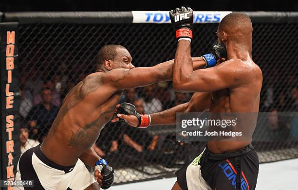 Ovince Saint Preux punches Jon Jones in their interim UFC light heavyweight championship bout during the UFC 197 event inside MGM Grand Garden Arena...