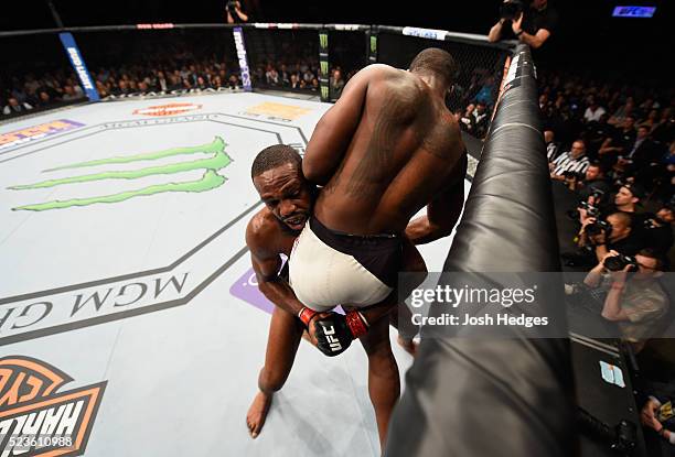 Jon Jones picks up Ovince Saint Preux in their interim UFC light heavyweight championship bout during the UFC 197 event inside MGM Grand Garden Arena...