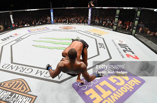 Jon Jones slams Ovince Saint Preux in their interim UFC light heavyweight championship bout during the UFC 197 event inside MGM Grand Garden Arena on...