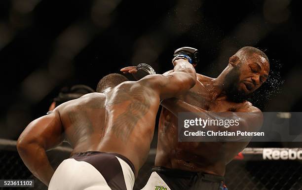 Ovince Saint Preux punches Jon Jones in their interim UFC light heavyweight championship bout during the UFC 197 event inside MGM Grand Garden Arena...