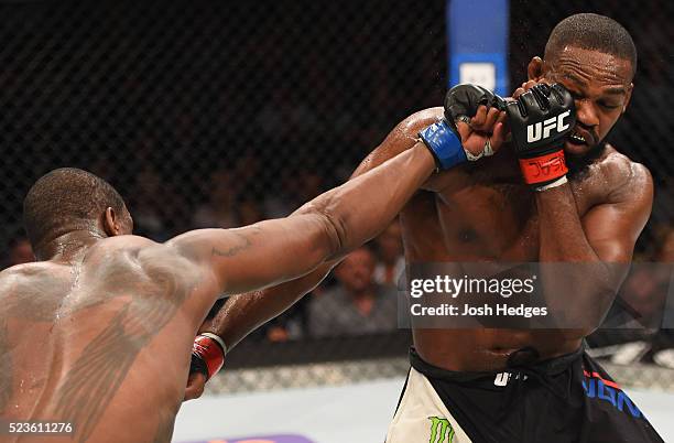 Ovince Saint Preux punches Jon Jones in their interim UFC light heavyweight championship bout during the UFC 197 event inside MGM Grand Garden Arena...