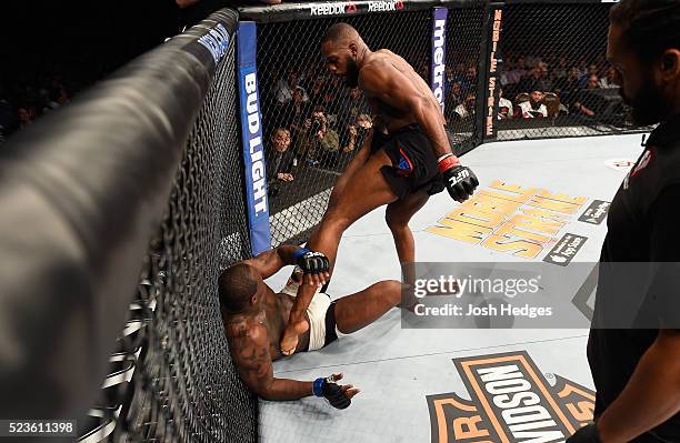 Jon Jones kicks Ovince Saint Preux in their interim UFC light heavyweight championship bout during the UFC 197 event inside MGM Grand Garden Arena on...