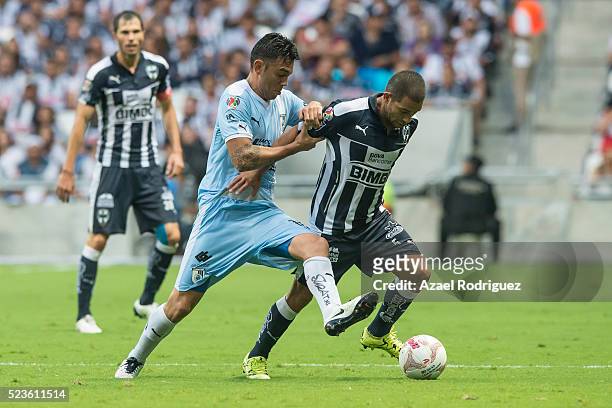 Walter Gargano of Monterrey fights for the ball with Nery Dominguez of Queretaro during the 15th round match between Monterrey and Queretaro as part...