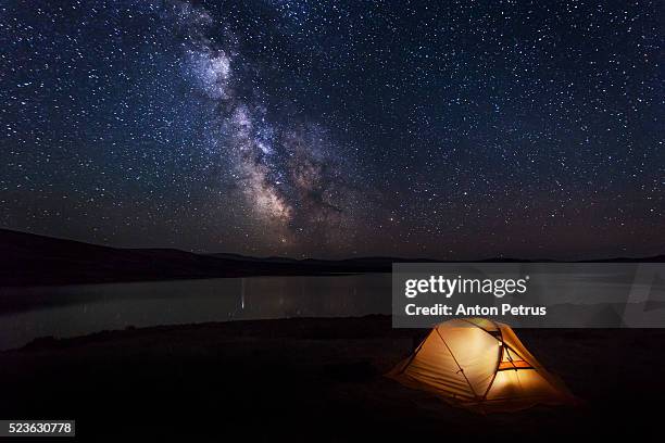 tent under the stars on the lake - laikipia ストックフォトと画像