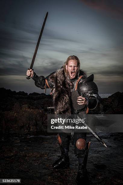 viking fighting on cliffs of palos verdes, california, usa - barbarian stock pictures, royalty-free photos & images