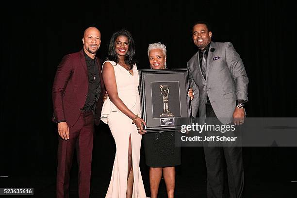 Common, Kim Foxx, a guest, and Lamman Rucker attend the Common Ground Gala on April 23, 2016 in Chicago, Illinois.