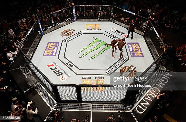 An overhead view of Jon Jones punching Ovince Saint Preux in their interim UFC light heavyweight championship bout during the UFC 197 event inside...