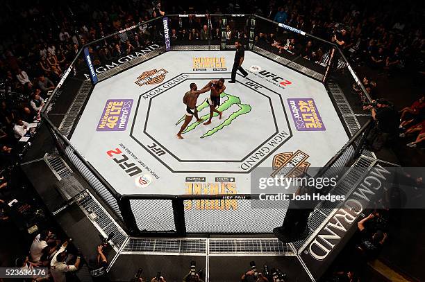 An overhead view of Ovince Saint Preux puncching Jon Jones in their interim UFC light heavyweight championship bout during the UFC 197 event inside...