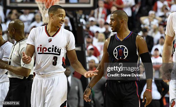 McCollum of the Portland Trail Blazers has some words with Chris Paul of the Los Angeles Clippers in the fourth quarter of Game Three of the Western...