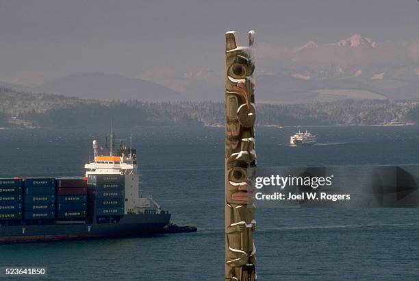 cargo ship crossing elliott bay - pike place market stock pictures, royalty-free photos & images