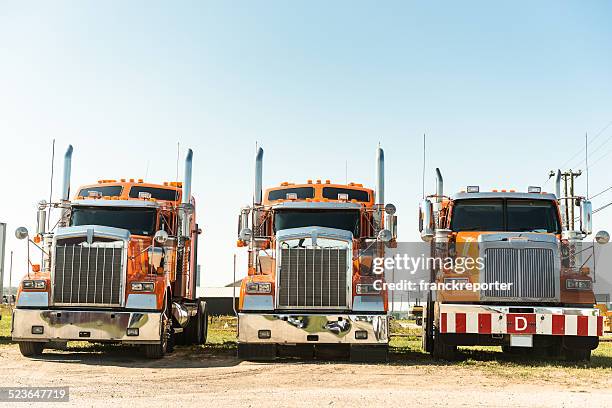 truck parked in a row - trucks in a row stock pictures, royalty-free photos & images