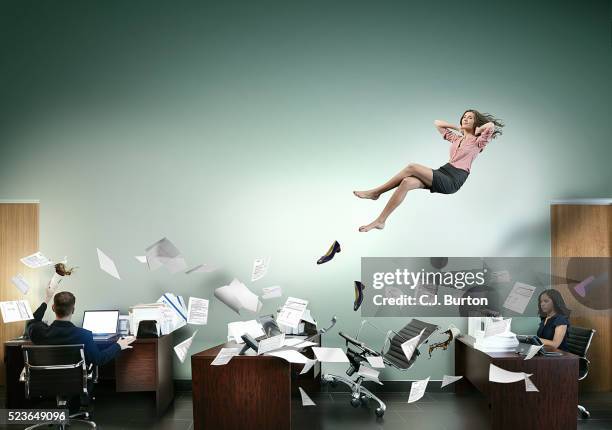 office worker taking work break - escapism imagens e fotografias de stock