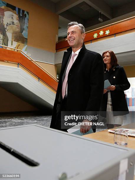 The candidat of the far-right Freedom Party Norbert Hofer smiles as he arrives at the polling station at the first round of Austrian President...