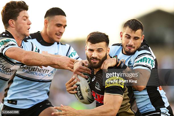 Josh Mansour of the Panthers is tackled during the round eight NRL match between the Cronulla Sharks and the Penrith Panthers at Southern Cross Group...