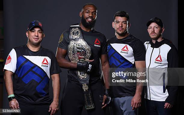 Jon Jones poses for a portrait with his team backstage during the UFC 197 event inside MGM Grand Garden Arena on April 23, 2016 in Las Vegas, Nevada.