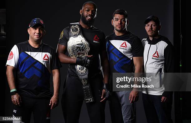 Jon Jones poses for a portrait with his team backstage during the UFC 197 event inside MGM Grand Garden Arena on April 23, 2016 in Las Vegas, Nevada.