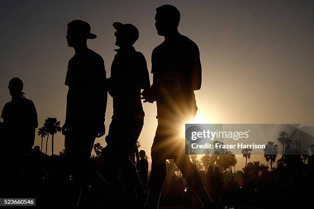 Music fans are seen during sunset at day 2 of the 2016 Coachella Valley Music & Arts Festival Weekend 2 at the Empire Polo Club on April 23, 2016 in...