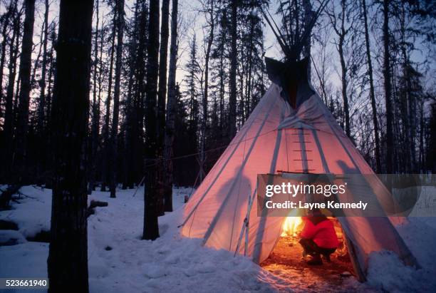 illumintated tepee at dusk - boundary waters canoe area stock-fotos und bilder