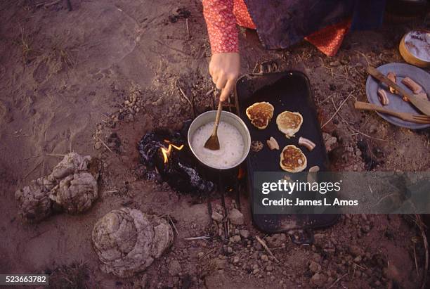 woman cooking for living history demonstration - scotts bluff national monument stock pictures, royalty-free photos & images