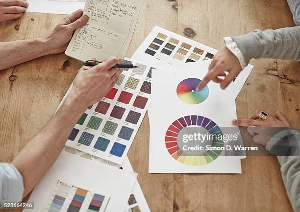 office workers choosing color samples - nuancier photos et images de collection