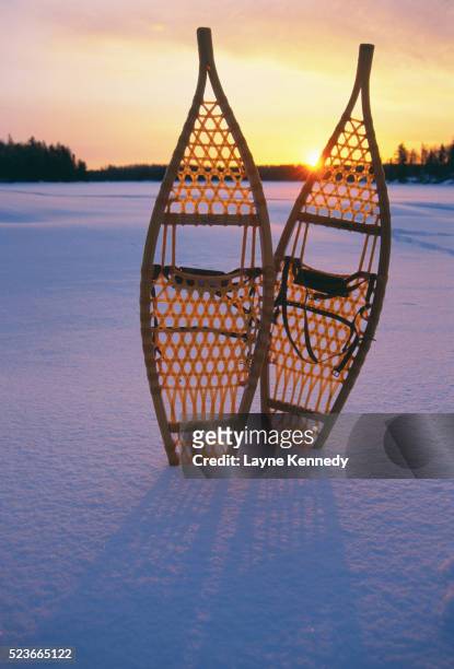 snowshoes on a frozen lake - boundary waters canoe area stock pictures, royalty-free photos & images